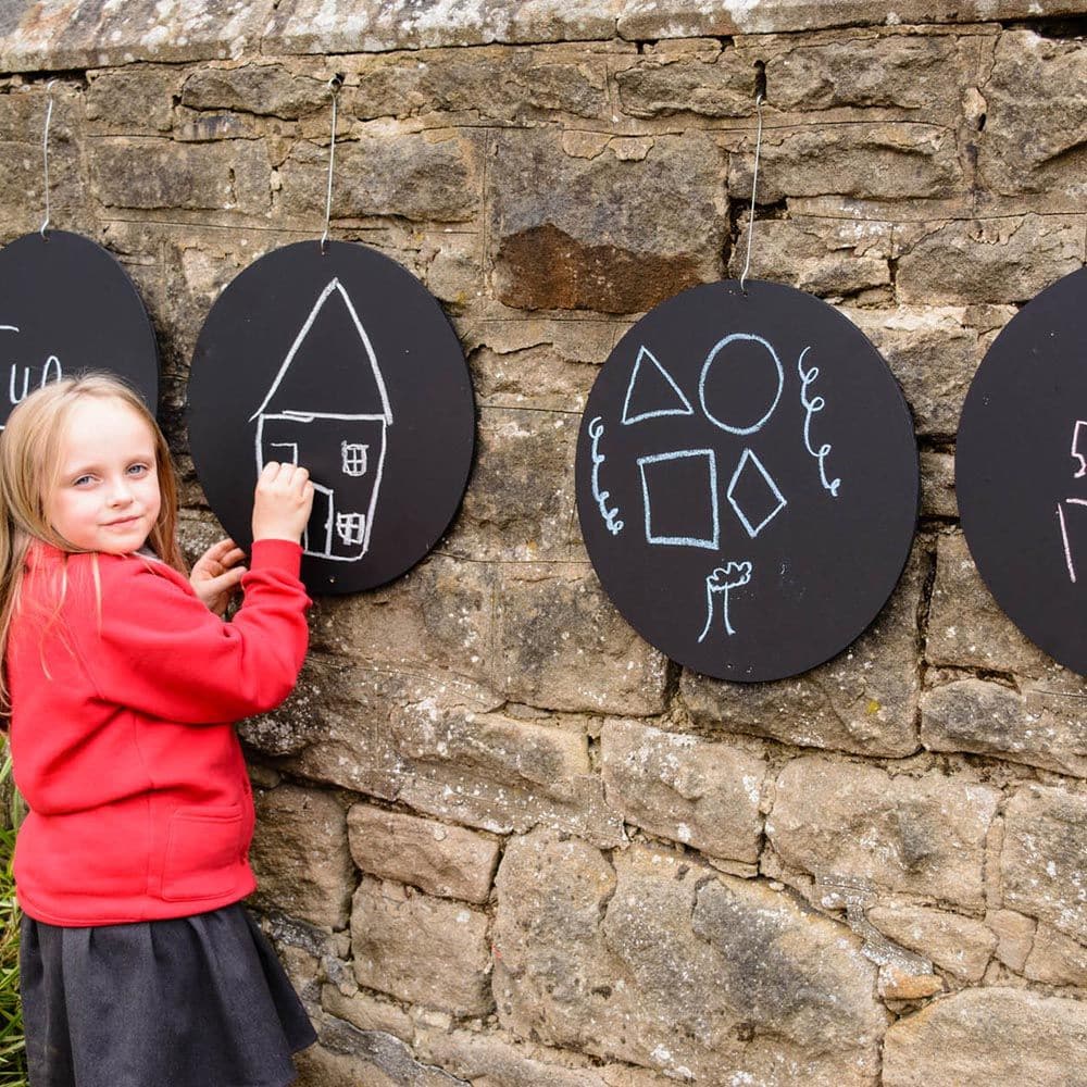 4 Pack Circular Chalkboards, Add a touch of creativity to your outdoor play areas with the 4 Pack Circular Chalkboards. These delightful chalkboards are not only practical but also serve as perfect focal points for children to unleash their artistic talents.Encourage mark-making and creative expression with these circular chalkboards. Children can use regular chalk or chalk pens (not included) to create vibrant designs, draw imaginative pictures, or even practice writing. With four chalkboards in the pack, 
