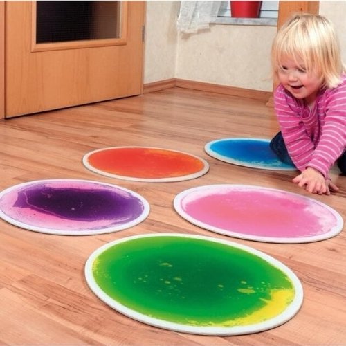4 Pack Round Liquid Tiles, Sensory liquid floor tiles provide a visual and tactile experience, that encourages movement and the exploration of surfaces. These round liquid floor tiles measure 50cm across. The Round Liquid Tiles are strong but thin floor tiles filled with a colourful liquid gel which flows and swirls around as you move about on them. Encourages movement by cause and effect - move and the colours move too! Gains visual attention Visually stimulating Tactile - tiles are cool with a slightly ro