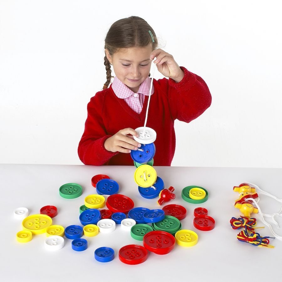 54 Pack Giant Threading Buttons, 54 giant Threading buttons in different shapes and colours enabling sequencing and sorting through tactile discrimination. The Giant Threading Buttons are great for honing fine motor skills, boosting dexterity and hand-eye coordination, these colourful buttons are great fun to fiddle with. Children can simply lace the large variety of Giant Threading Buttons on the lace, or they can sort or lace by colour or button shape. While they play with the Giant Threading Buttons they