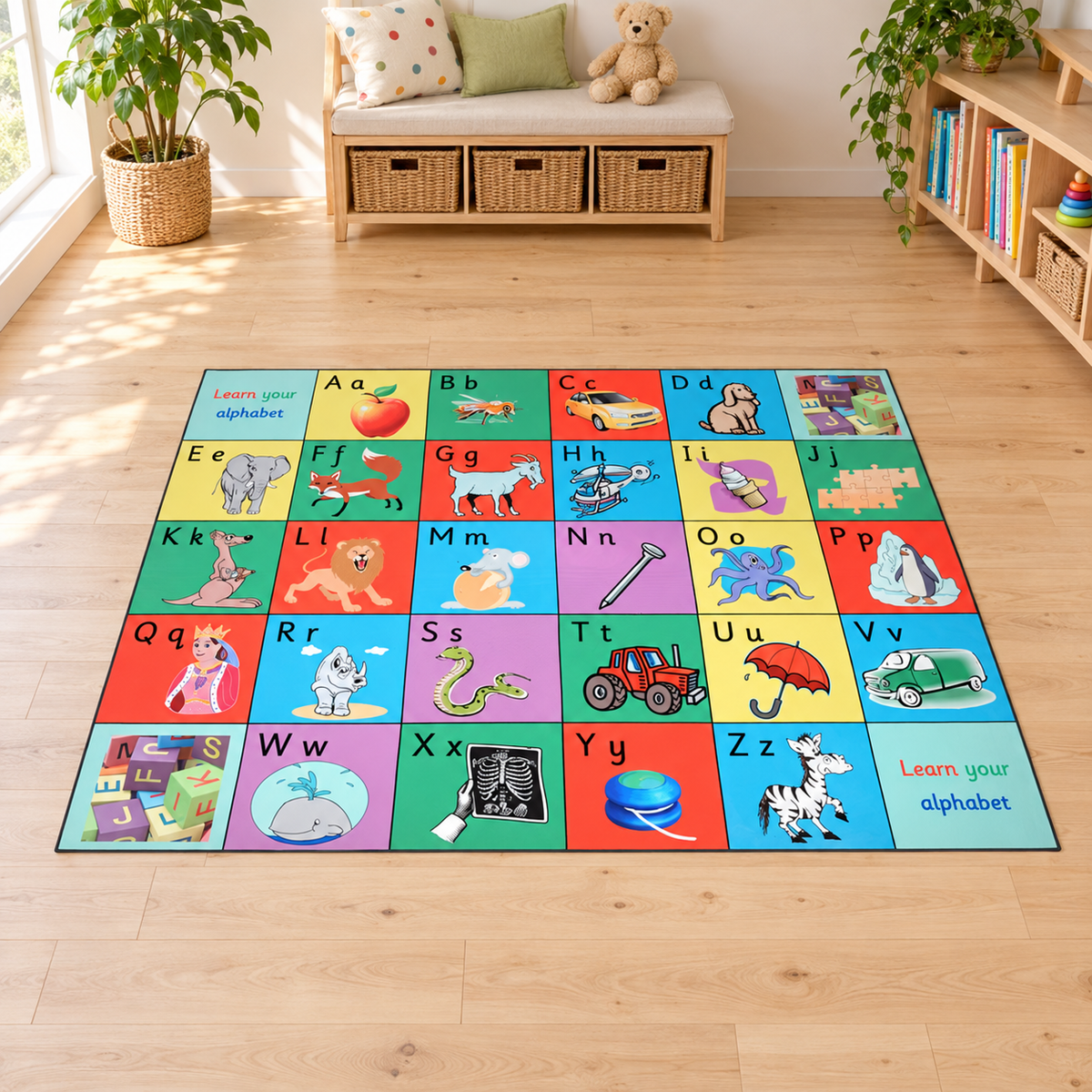 Alphabet Supergiant Playmat 2m x 1.5m with uppercase and lowercase letters and picture prompts on a pale wooden early years floor