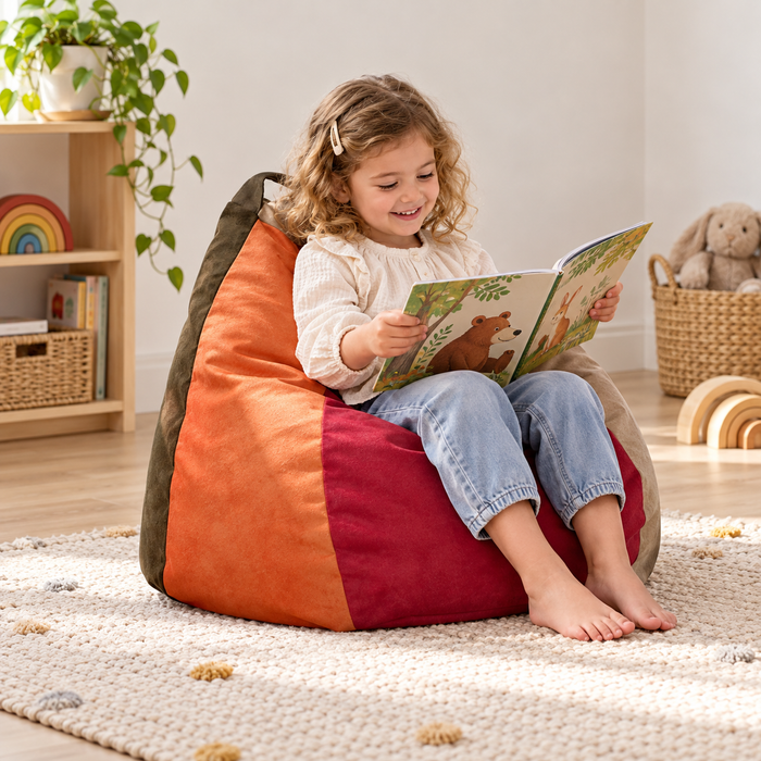 Suede Pear Bean Bag in use by a child during reading and play in an early years setting, lifestyle view 1