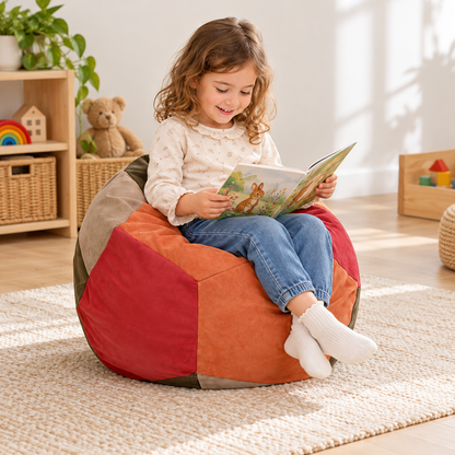 Suede Pear Bean Bag in use by a child during reading and play in an early years setting, lifestyle view 3