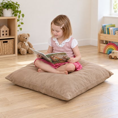 Suede Giant Cushion in use by a child during reading and play in an early years setting, lifestyle view 1