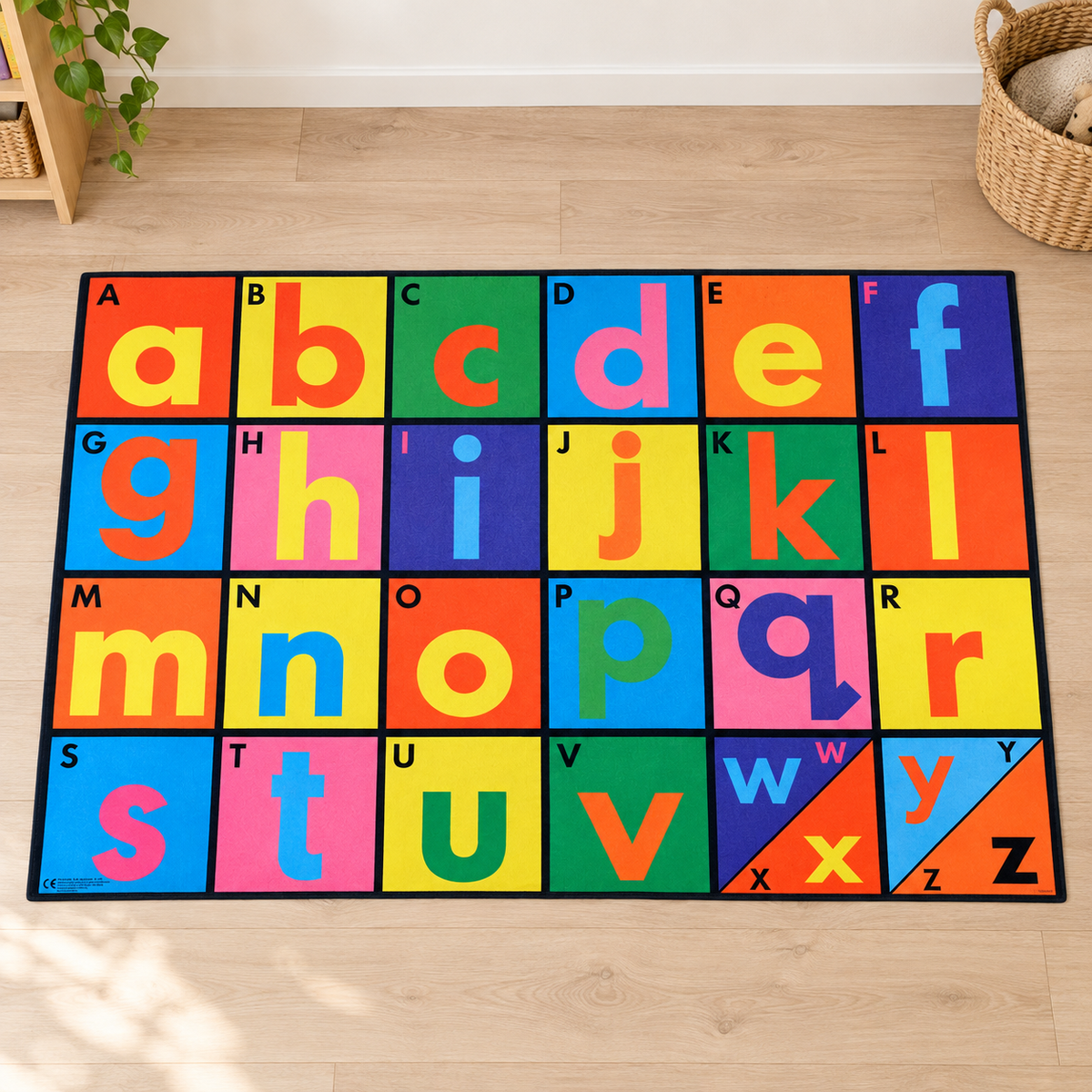 Alphabet Playmat 1.5m x 1m with coloured uppercase and lowercase letters in a bright early years play setting