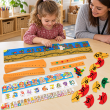 Children using the 950 x 240mm tabletop worm number-line jigsaw from the Number Line Activity Pack with an adult, view 1