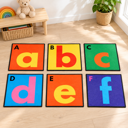 Selection of six separate Alphabet Floor Tiles showing A to F in an early years play setting