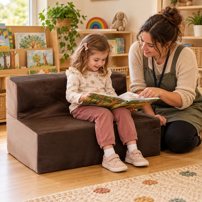 Child using 700mm wide suede sofa with 300mm seat height during reading and play in a nursery