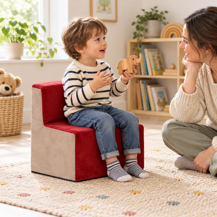Suede Toddler Chair in use by a child during reading and play in an early years setting, lifestyle view 1
