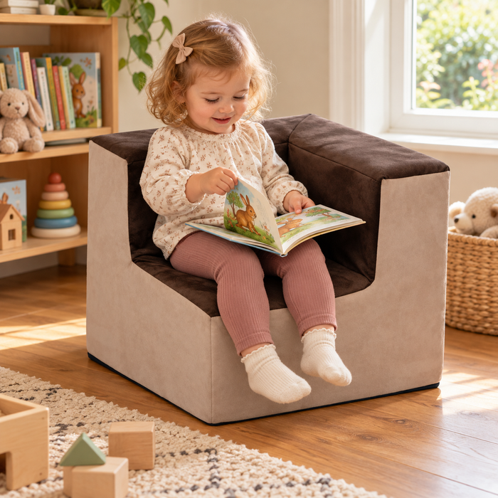 Suede Toddler Corner Chair at 400 x 400 x 400mm in use during reading or storytelling by a child in a nursery