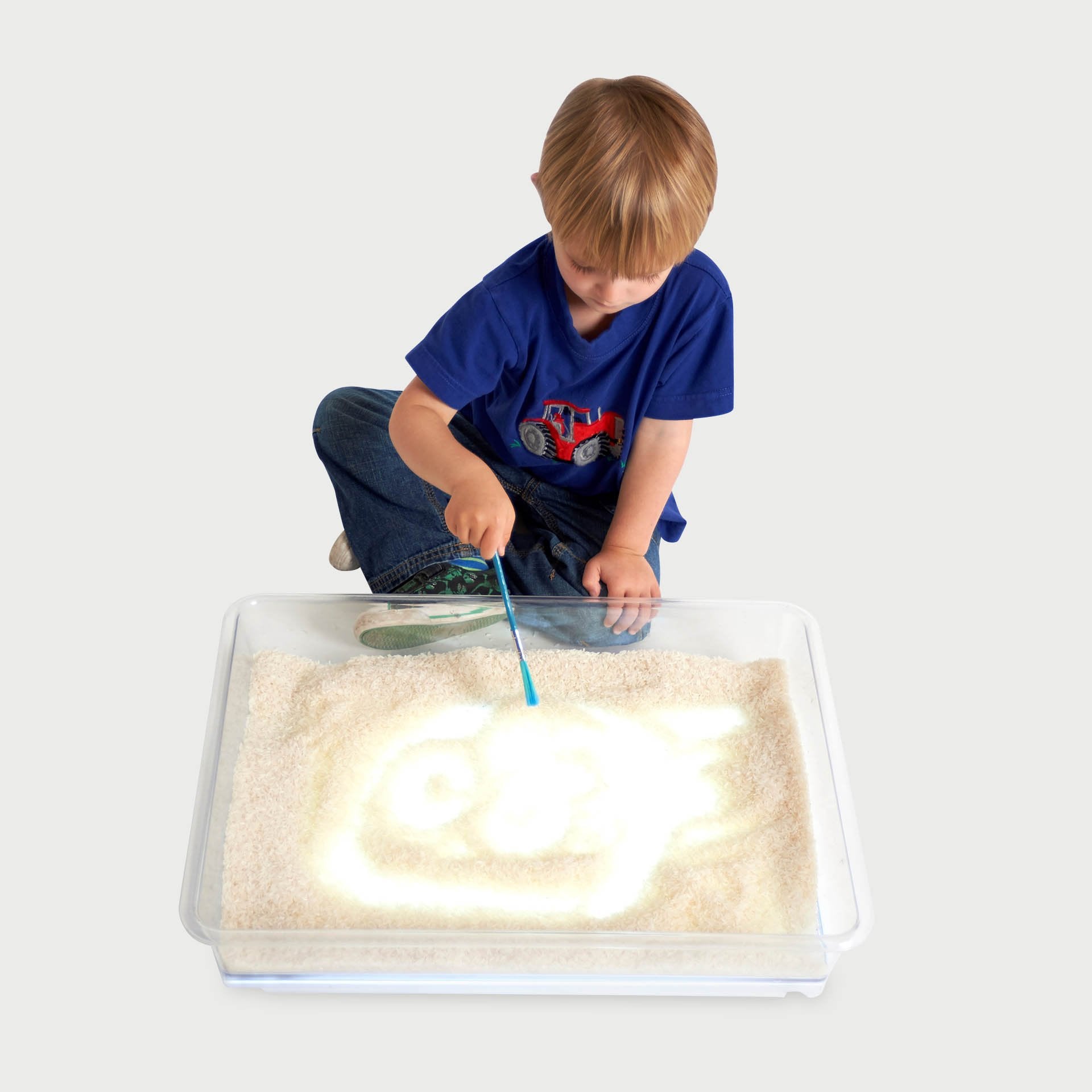 A3 Exploration Light Tray, This A3 Exploration Light Tray is for use on a desk, on the floor - inside or out . The A3 Exploration Light Tray is made from clear polycarbonate giving it incredible strength and longevity in the classroom where its rigidity means that even when filled with water it can be lifted and moved around without it flexing. In addition to its everyday uses with a variety of liquids and textures for general artwork the A3 Exploration Light Tray has been cleverly designed to fit over our 