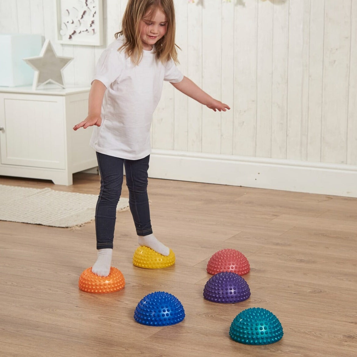 Abili Sensory Stepping Stones, The Sensory Stepping stone Balance Pods are the ideal tool for proprioception, reducing tactile defensiveness, and coordination therapy. The Sensory Stepping Stones are supplied as a pack of 6,this creates endless possibilities to aid development skills such as balance,gross motor skills etc. These Balance Sensory Stepping Stones have a bumpy surface that provide feet with input as a child walks barefoot. The Balance Pods can also be weighted down with water. The set contains 
