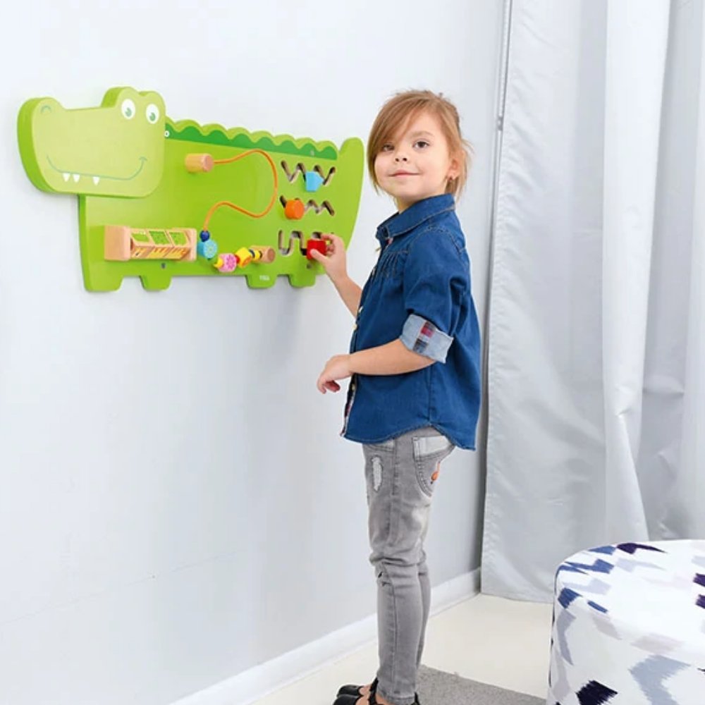 Activity Wall Panel Crocodile, The Activity Wall Panel Crocodile toy is big enough to allow multiple children to play at the same time but small enough so that when fastened to the wall, it doesn't take too much space. Ideal for the wall at home, waiting room, treatment rooms or in your nursery or school. The Activity Wall Panel Crocodile is Ideal for developing hand-eye co-ordination, finger control and fine motor skills. Wall fixings included. The Activity Wall Panel Crocodile also provides problem solvin