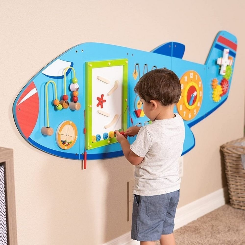 Aeroplane Activity Wall Panel, The Aeroplane Activity Wall Panel is made in five pieces, each with a different set of manipulative activities to encourage hand-eye coordination and fine motor skills including: a clock with moving hands, wire bead maze, magnetic pens, shape maze and interlocking gears. The Aeroplane Activity Wall Panel comes fully assembled with fixing holes and attachment screws for easy fitting to a wall.The Aeroplane Activity Wall Panel supports the following areas of learning: Physical D