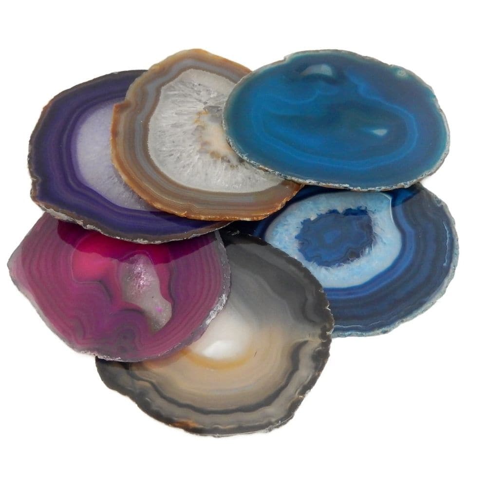 Agate Slices Pack of 6, These Agate Slices are not only visually stimulating but also offer a tactile experience. Kids can explore the smooth texture and varying sizes of each slice, engaging their sense of touch and promoting sensory play.Being thin slices, these agate crystals allow light to pass through them, creating a mesmerizing effect when placed on a light box. Watch as the vibrant colours glow and illuminate, providing a captivating visual experience for children of all ages. Whether used in a clas