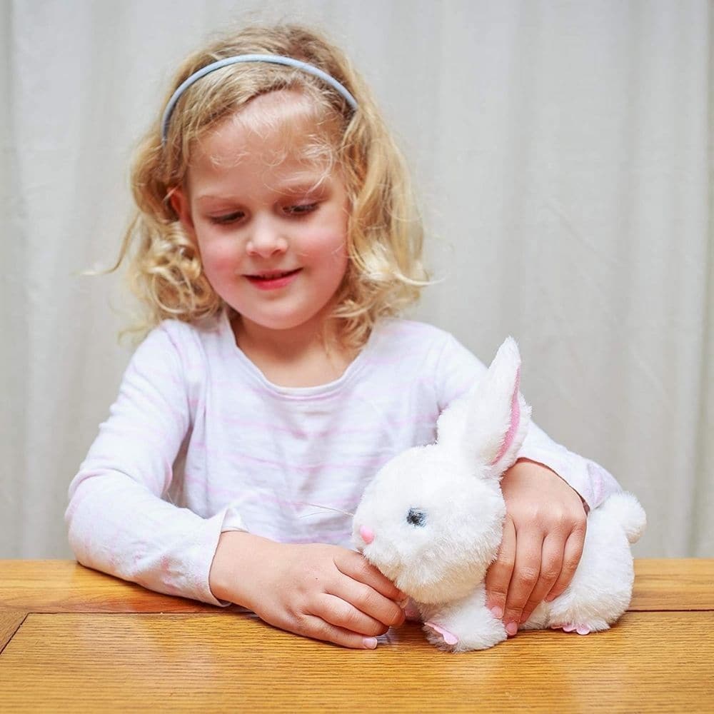 Animigos New Born Bunny, Introducing the New Born Bunny from our exclusive Animigos collection. This irresistible baby bunny plush toy is designed to charm and delight with its soft, furry features and interactive elements. The New Born Bunny comes with a plastic drinking bottle that hangs around its neck, adding a touch of realism to playtime. Your child can enjoy hours of fun and imaginative play by placing the tip of the bottle to the bunny's mouth, triggering a sound effect that mimics the lapping sound