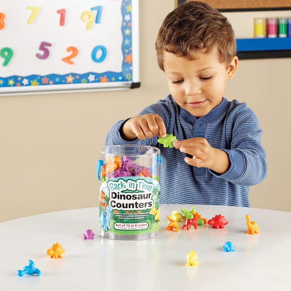 Back In Time Dinosaur Counters Set of 72, Welcome to a world where learning meets fun! The unique and attractive Back In Time Dinosaur Counters™ are here to infuse vibrancy and excitement into early maths activities. These counters aren’t just educational tools; they are colorful buddies turning every learning session into a joyful adventure! 🌈 Vibrant & Engaging: With their modern design and bright colors - Blue, Red, Orange, Yellow, Green, and Purple, these dinosaur counters are set to captivate young min