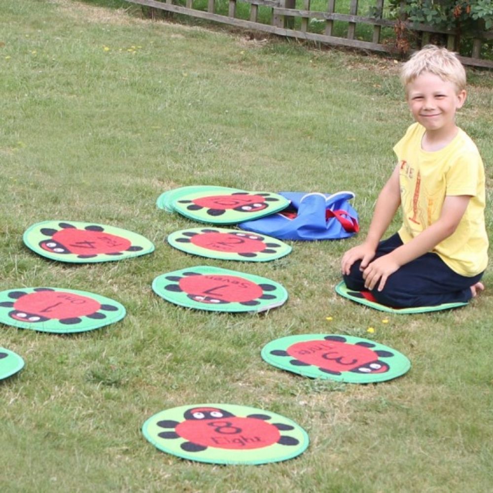 Back to Nature Counting Ladybird Indoor Outdoor Mini Carpets, The Back to Nature Counting Ladybird Indoor Outdoor Mini Carpets are a delightful addition to your outdoor and indoor learning area for activities such as reading and group play. The Back to Nature Counting Ladybird Indoor Outdoor Mini Carpets come as a 24 piece set with a free storage bag so they can be moved around with ease. With FREE holdall. Mat features: Distinctive and brightly coloured, child friendly designs. Designed to encourage learni