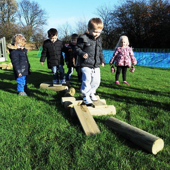 Balance Bundle, The Balance Bundle is a set of 6 1. 2m half round logs. Our Balancing Logs Set can be placed in a variety of layouts to suit your outdoor play area. Ideal for developing muscles, stability and balance. The Balance Bundle can be easily packed away and set up again, ideal for settings with smaller outdoor spaces. Dimensions (L): 1200mmLength Each Weight: 15KG, Balance Bundle,Early years balance toys,nursery balancing toy resources,special needs balancing path toys,special needs balancing toys,