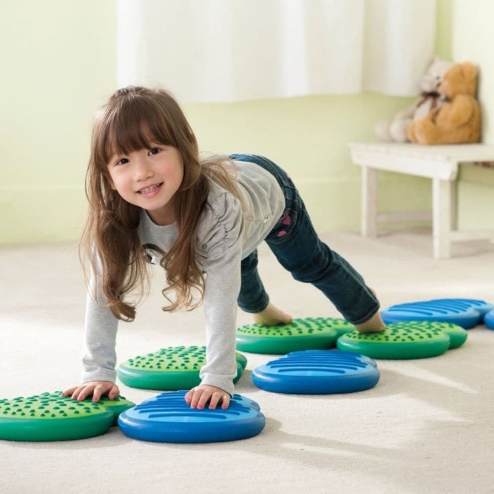 Balance Stepping Clouds, Balance Stepping Clouds are a great new way to build balance, posture and core strength. The sides and bottom of each dual-chambered piece are made from a soft, pliable plastic that allows air to travel between the two chambers when stepped upon. The top has an anti-slip tactile surface that provides secure foot positioning and sensory stimulation. Great for working balance in all directions. Each set comes with two blue and two green Stepping Clouds, a user guide with activities an