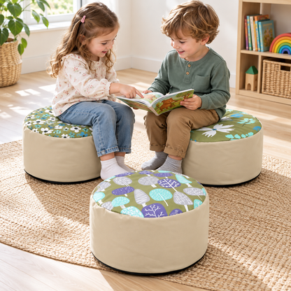 Two children sharing a book on Beany Buffets