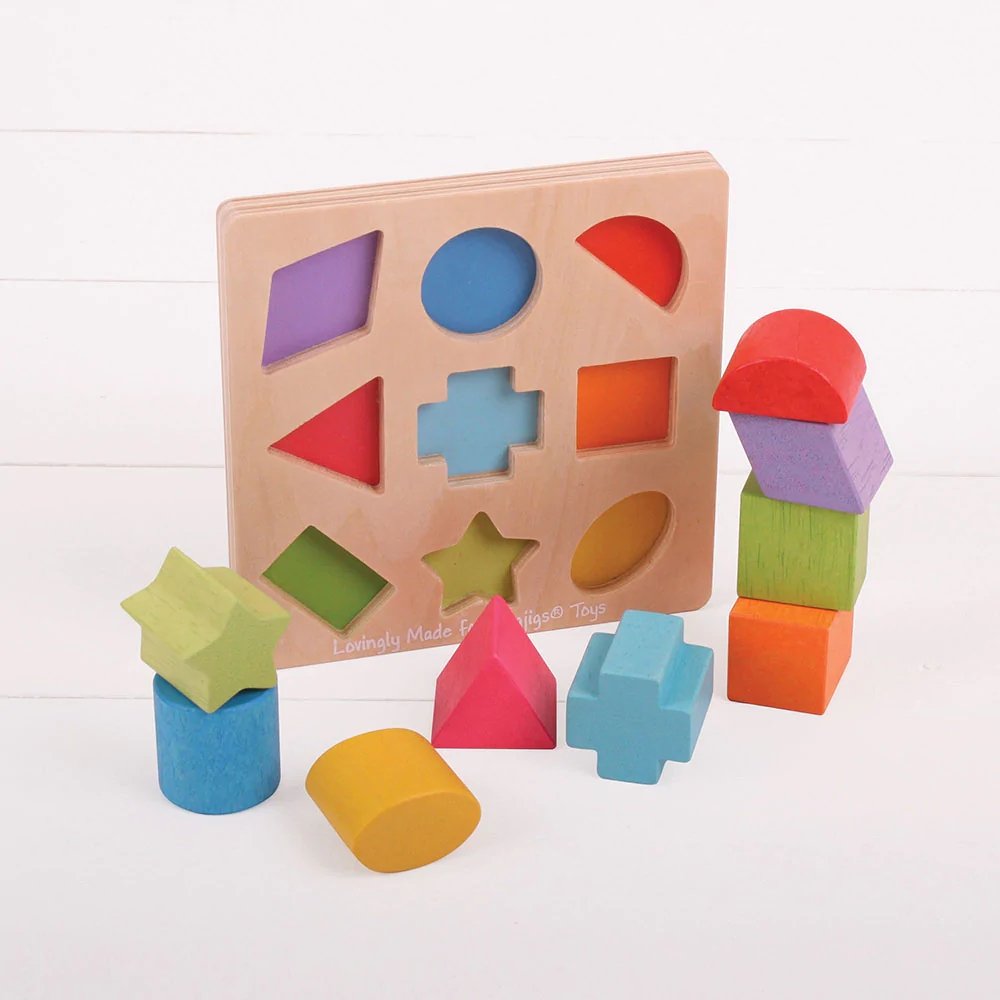 Bigjig First Shapes Sorter, The Bigjig First Shapes Sorter offers a fantastic playtime experience for little ones who are just beginning to explore the world of shapes and colours. Designed for ages 1 and up, this interactive toy comes with high-quality wooden shapes that fit into corresponding slots on a sturdy base board. Features of the Bigjig First Shapes Sorter Simple Yet Engaging Design 10 Play Pieces: The set consists of chunky, brightly coloured wooden shapes. Base Tray: After playtime, all blocks c