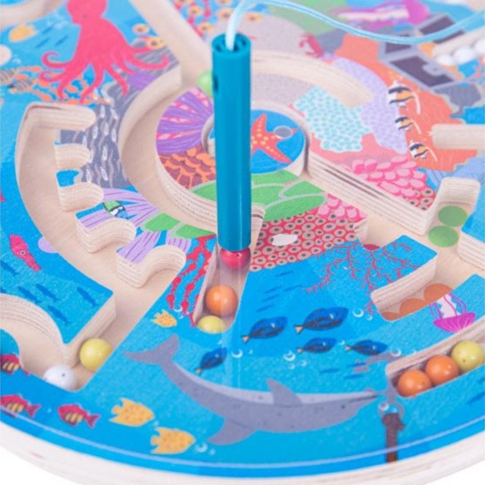 Bigjigs Aquatic Maze Puzzle, Get ready for some aquatic adventures with our beautiful and bright Aquatic Maze Game . Features four different coloured small magnetic balls that need to make the journey to the other side of the wooden board. The magnetic balls are surrounded by a wooden frame embellished with a wonderful underwater aquatic scene. Can you find the octopus? Where’s the scuba diver? Little fingers can navigate the maze by moving the balls through it. A great way to develop kids’ fine motor skill