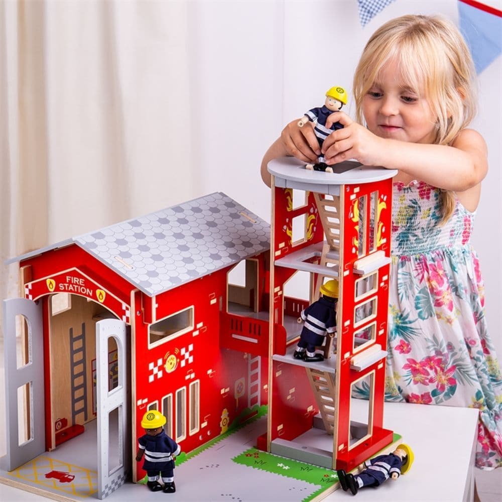 Bigjigs City Fire Station, Ignite imaginative play with this fiery Bigjigs City Fire Station Playset, where the firefighters are alert and ready to race to the rescue! This delightfully detailed wooden fire station features a firefighter's pole, training tower with removable ladders, mezzanine for firefighters living quarters, working double doors and removable roof panels for easy access. Firefighters can slide down the pole to jump into the action, or when there are no emergencies, they can relax on the m