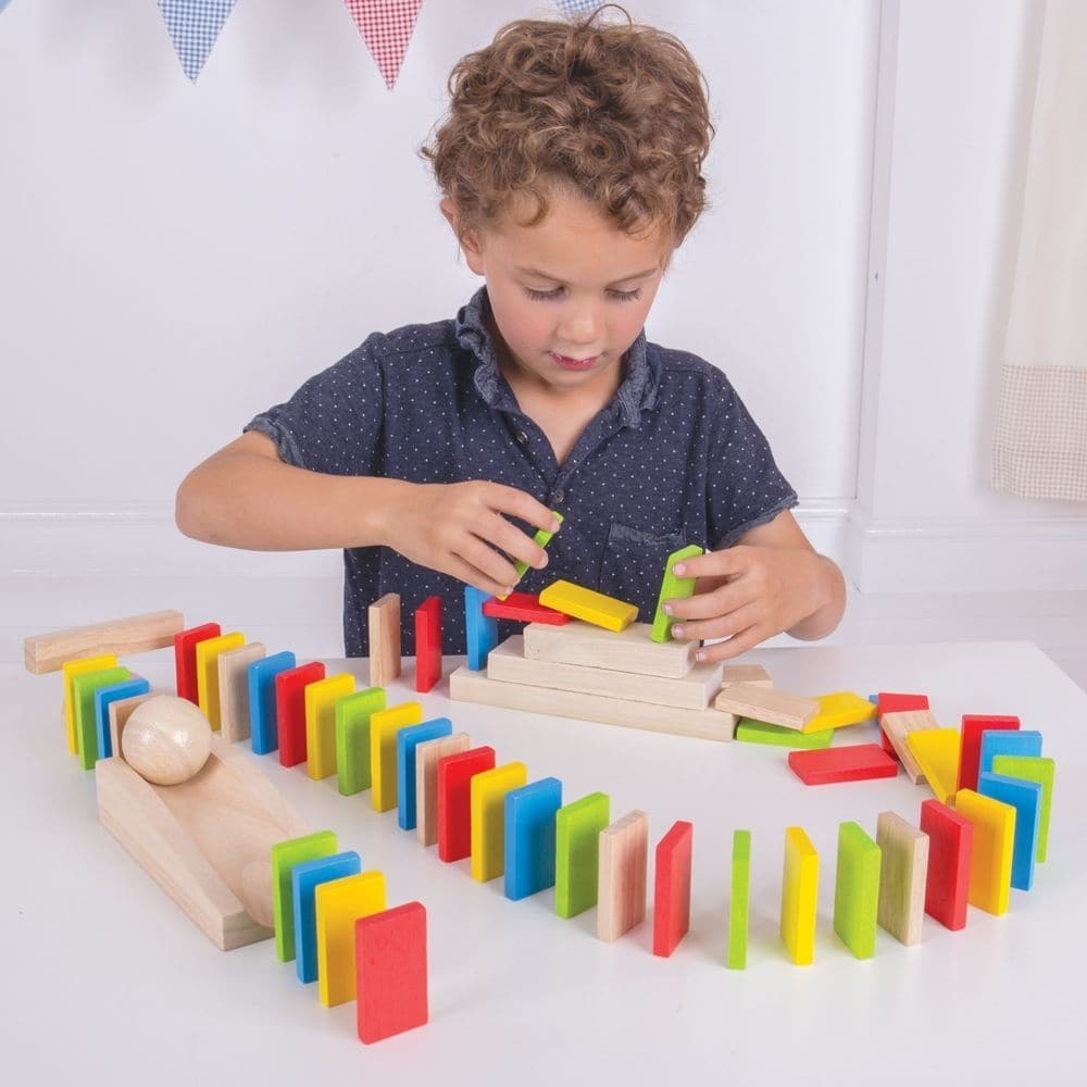 Bigjigs Domino Run, The Bigjigs Domino Run is an extensive wooden domino set that will keep children, and even adults, entertained for hours on end. Children can set up the dominoes in a range of sequences, knock them down, and repeat over and over again! This 110 piece dominoes toy comes complete with a ball, ramp, two direction changers and stairs which can be added to any sequence to make it even more exciting! The fun doesn't have to end there though, children can get creative using books, CD cases and 