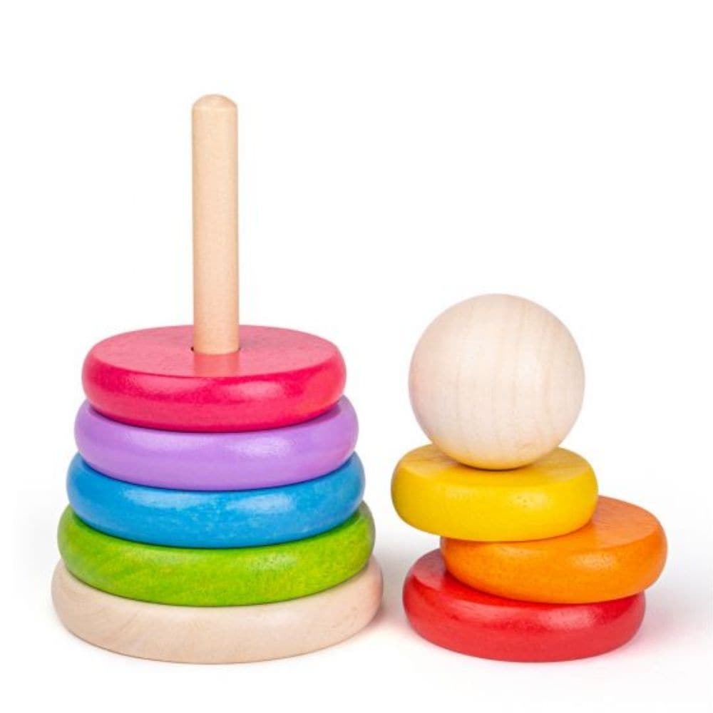 Bigjigs First Rainbow Stacker, Learn all about size, from the biggest to the smallest, with this brightly coloured Bigjigs First Rainbow Stacker that features wooden hoops to stack on the pole. The Bigjigs First Rainbow Stacker folds flush with the stand when it's empty, for optimum safety. The Bigjigs First Rainbow Stacker helps to develop dexterity and co-ordination. The Bigjigs First Rainbow Stacker is made from high quality, responsibly sourced materials. Conforms to current European safety standards. C