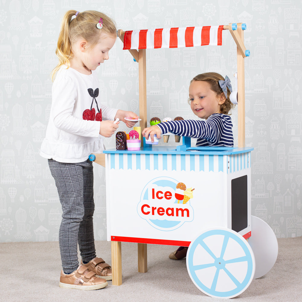 Bigjigs Ice Cream Cart, Serve up some yummy ice cream to friends and family - theres plenty to go around! This quality wooden Ice Cream Cart comes complete with 6 ice creams, 9 ice lollies, 2 ice cream pots with spoons and an ice cream scoop. Spark hours of imaginative and educational pretend play with these wooden sweet treats as little ones develop their vocabulary whilst selling and serving ice cream to their friends and family. The Bigjigs Ice Cream Cart is a great way to encourage creative and imaginat