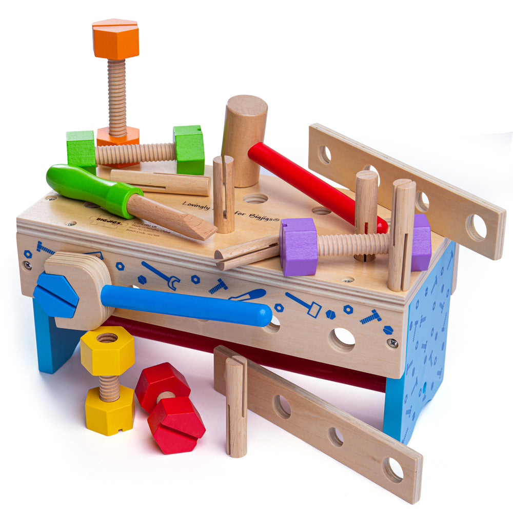 Bigjigs My Workbench, This cleverly designed wooden Carpenters Kids Workbench includes a wooden spanner, file and hammer and lots of wooden nuts and bolts. When it's time to pack up, everything can be stored away neatly by turning the kids workbench upside down and placing all of the items inside. Includes a built in carry handle, so this wooden toy can travel with your little one! Made from high-quality, responsibly sourced materials. Conforms to current European safety standards. Consists of 18 play piece