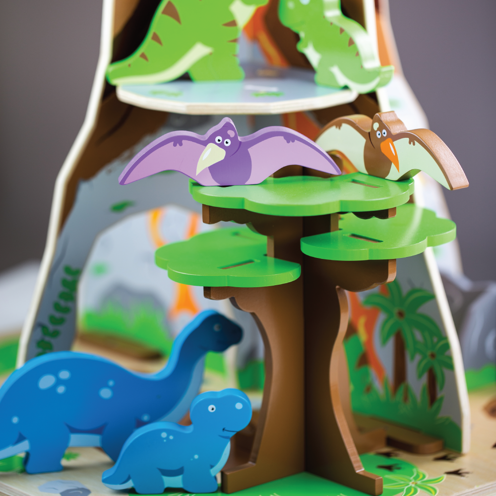 Bigjigs Wooden Dinosaur Island Playset, Travel back to a time when super-sized creatures ruled the world with this Bigjigs Wooden Dinosaur Island Playset. This complete Bigjigs Wooden Dinosaur Island Playset includes 8 dinosaurs, a nest and 2 eggs, a waterfall and a freestanding tree all ready and waiting to provide hours of imaginative play. The freestanding tree is movable and the dinosaurs include adult and baby dinosaurs and 2 pterodactyls. Hide behind the waterfall, climb the volcano or balance on the 