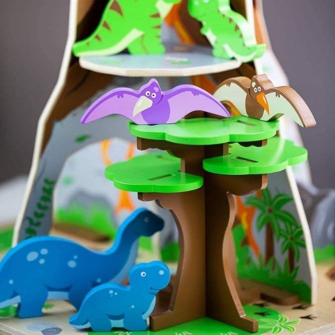 Bigjigs Wooden Dinosaur Island Playset, Travel back to a time when super-sized creatures ruled the world with this Bigjigs Wooden Dinosaur Island Playset. This complete Bigjigs Wooden Dinosaur Island Playset includes 8 dinosaurs, a nest and 2 eggs, a waterfall and a freestanding tree all ready and waiting to provide hours of imaginative play. The freestanding tree is movable and the dinosaurs include adult and baby dinosaurs and 2 pterodactyls. Hide behind the waterfall, climb the volcano or balance on the 