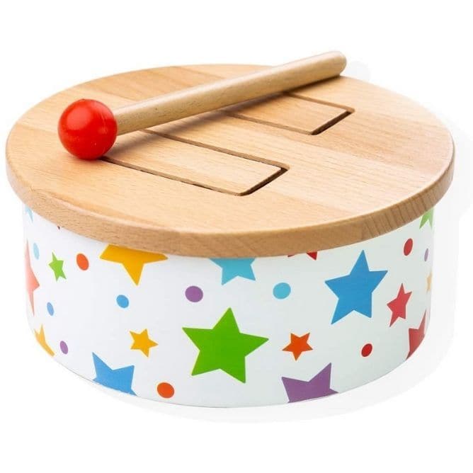 Bigjigs Wooden Drum, Inspire a talent for music with the colourful Wooden Drum from Bigjigs Toys. This delightful wooden instrument is ideal for early music making and developing a child's love of music. Designed for smaller hands, the included mallet is perfectly sized for little hands to grasp and beat the drum with! The cut-outs in the wooden top enables the drum to generate different sounds depending on where it is hit. With each strike, young ears will be presented with a pleasant sound, encouraging th