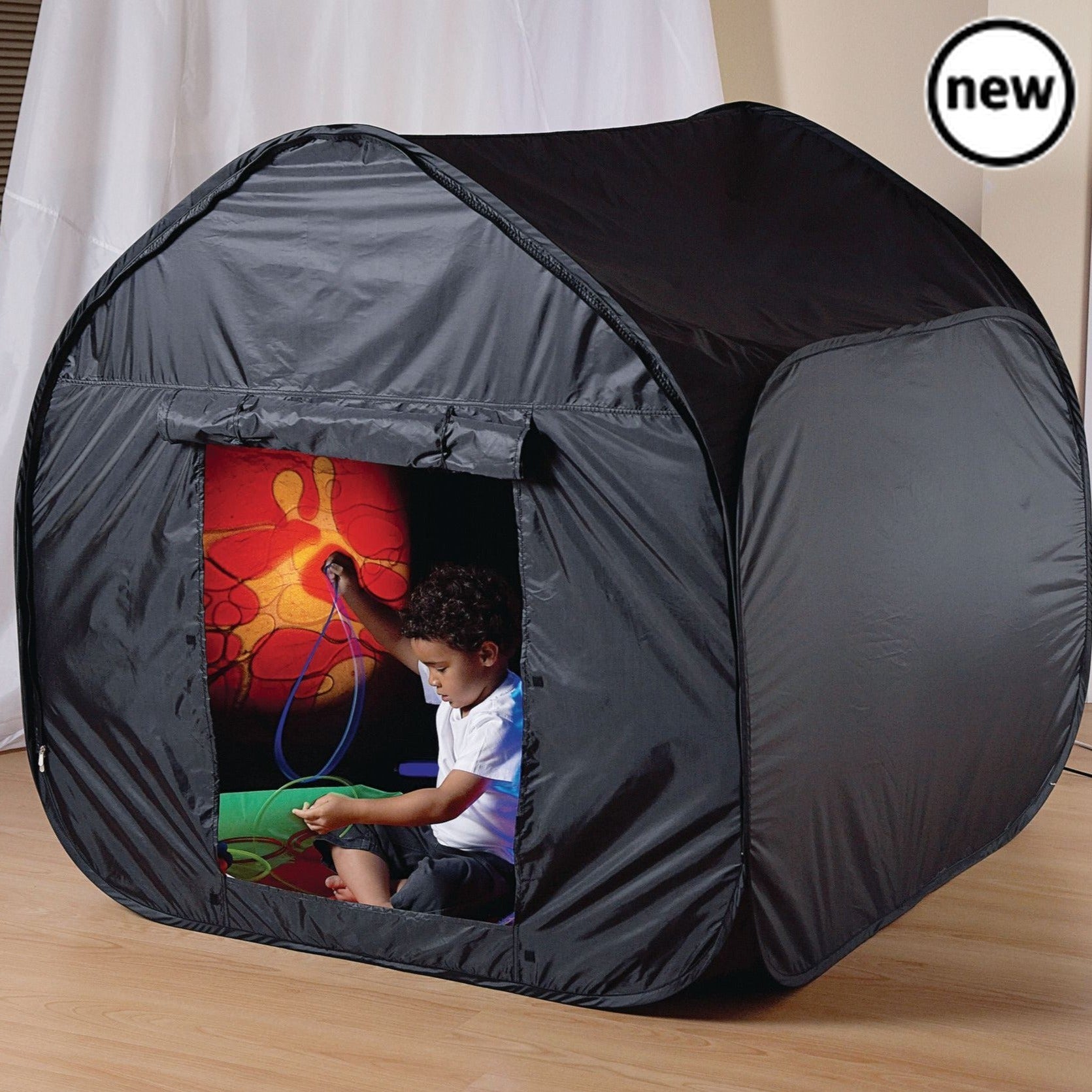 Black Dark Den, This fantastic pop-up sensory dark den pod is ideal for environments where a full sensory room is not available. Suitable for multiple users, the Dark Den Pod creates a temporary sensory room, with flaps which can tie up to create an open doorway into the area. Ideal for use with projectors and light sources, the double layered black environment creates a safe and enclosed area for sensory exploration. The Dark Den Pod is modular and can be easily joined with other Pods - perfect for creatin