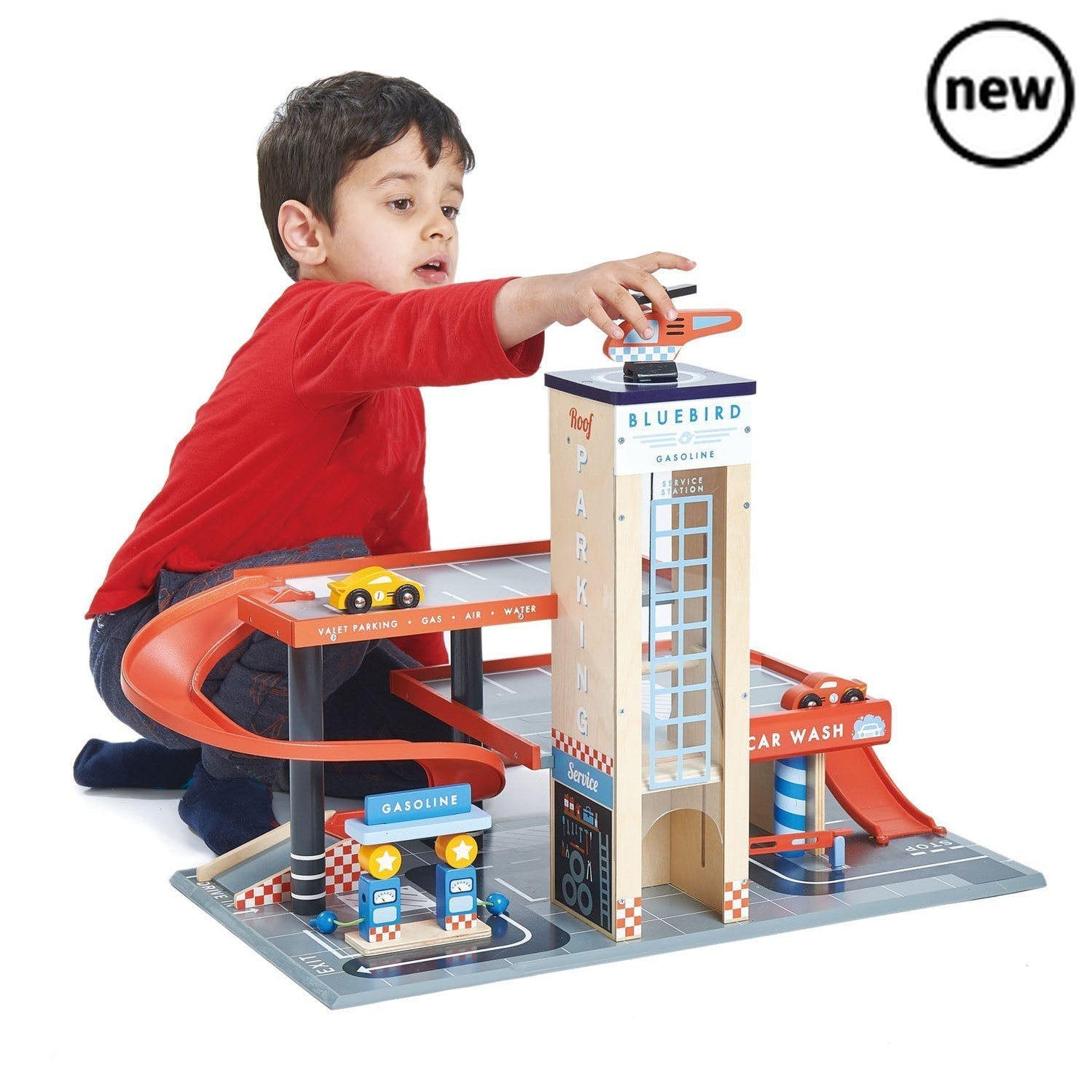 Blue Bird Service Station, Welcome to the Blue Bird Service Station, where your child's imagination will soar! This magnificent garage and service station is designed for endless play from all angles. Featuring a unique clear acrylic central panel, this service station allows your little one to explore the world of car maintenance and repair. Equipped with two ramps, your child can simulate driving in and out of the station with ease. The manual and moving lift adds an extra element of realism, allowing you