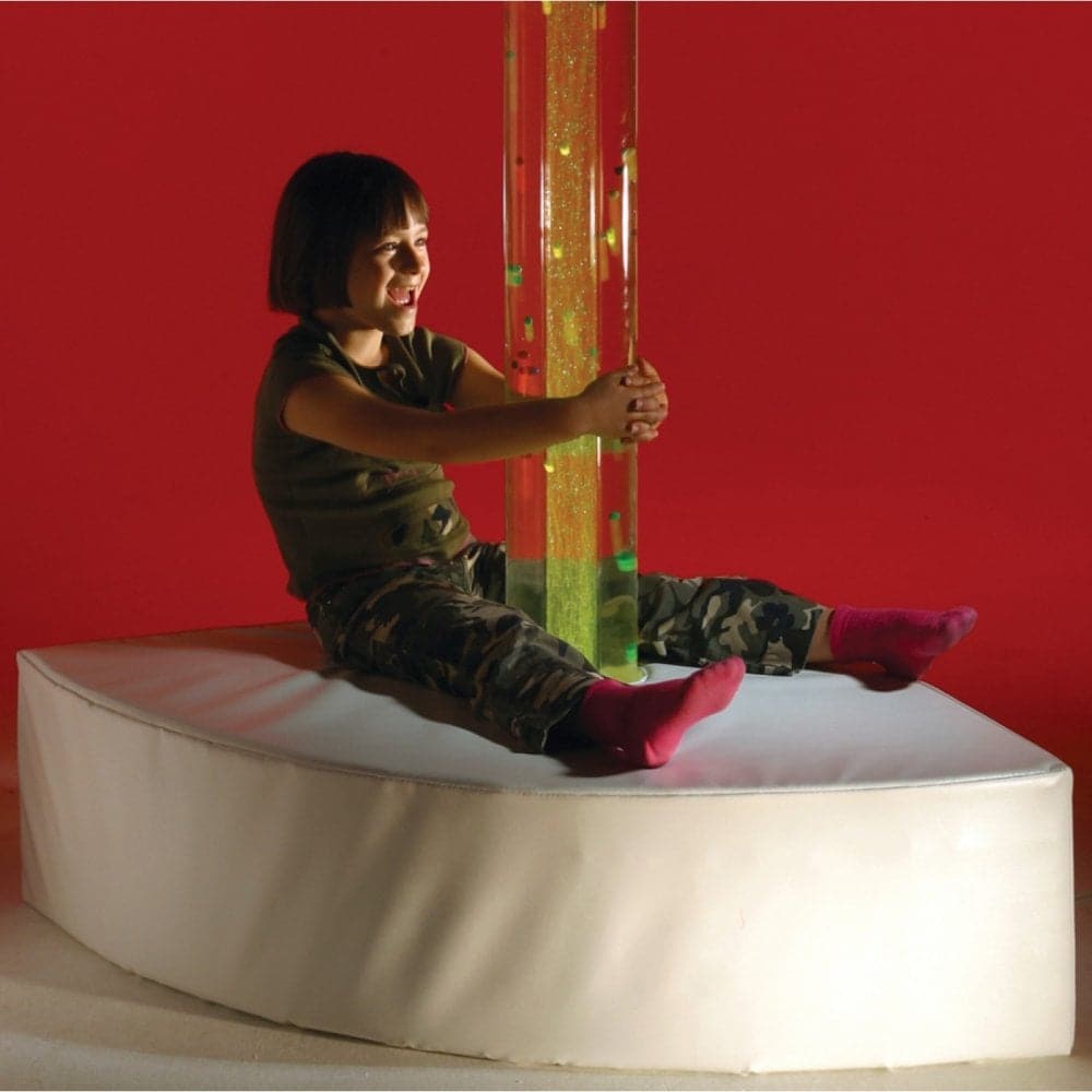 Bubble Tube Corner Plinth Large, Encourage users to sit close and feel the soft vibrations of the flowing water in their Bubble Tube with the Bubble Tube Corner Plinth . The Bubble Tube Corner Plinth is covered in a soft durable White Vinyl Fabric that is easy to wipe clean. The padded Bubble Tube Corner Plinth protects children from any sharp or technical bits and allows one to get up close and personal to the bubble tube feature. Please check sizing of tube to ensure the base fits your chosen bubble tube.