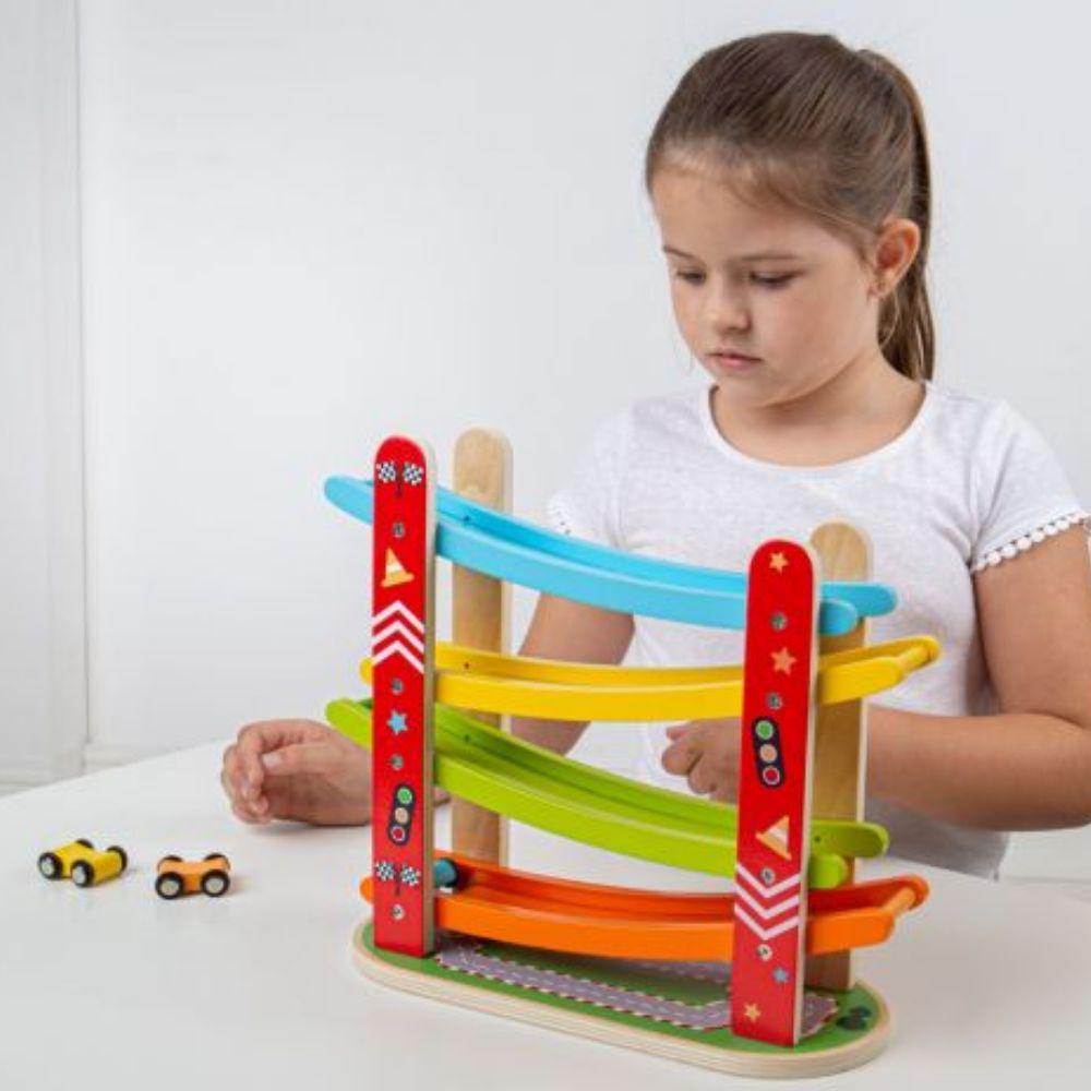Car Racer, Its race time! The Bigjigs Toys Wooden Car Racer is a classic racing wooden car ramp that provides hours of pretend play fun! Little ones will love watching the mini wooden cars race down the ramps and shoot out at the bottom! Can you catch them before they reach the end? Youll have to be quick! This premium-quality wooden car ramp is a great game for friends or kids to play individually. Includes 4 colourful cars. A great way to encourage imaginative play. Made from high-quality, responsibly sou