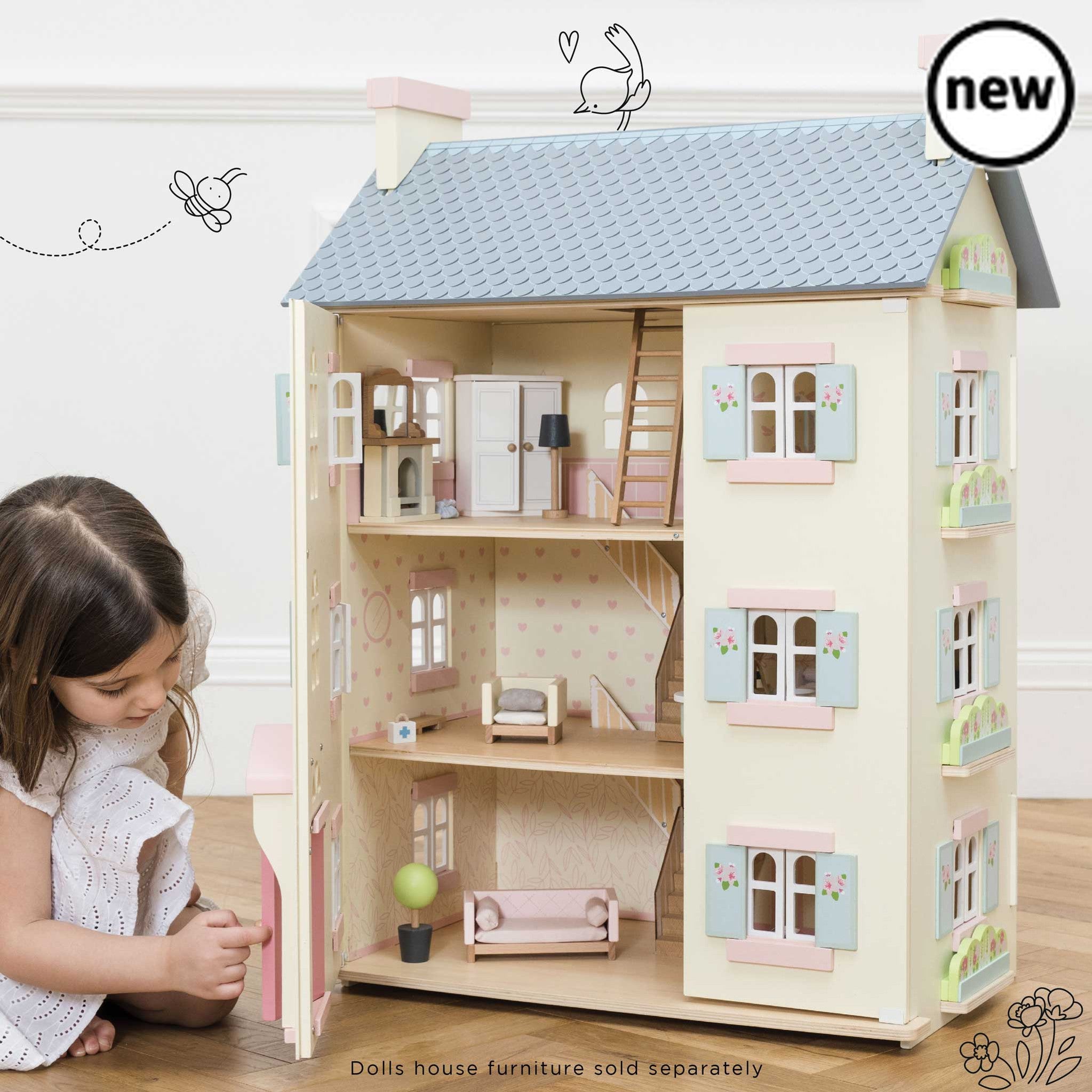 Cherry Tree Hall Doll House, Description Welcome home! This grand 4 storey wooden dolls house makes a stunning addition to your child’s toy collection. Role play fun adventures await with this simply stunning toy doll house, fitting for any miniature lord or lady. Full of exquisite details, this grandiose home is fully painted in soft creams with pink and blue accents and sweet flower motif detailing. A beautiful arched window feature sets off this truly magnificent house and the handsome front door is just