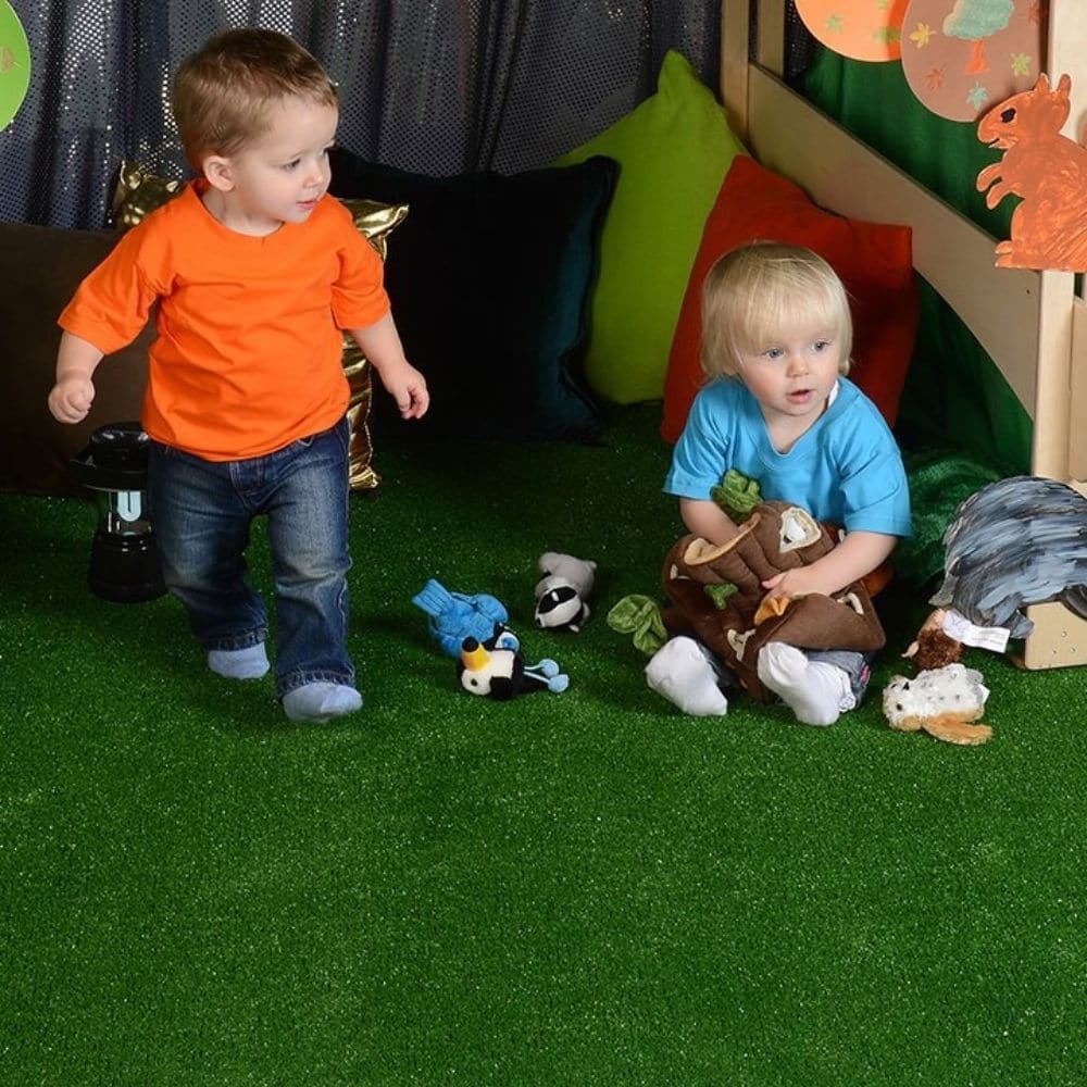 Children's Landscape Grass Rug, The Children's Landscape Grass Rug provides a textured area with a grassy look which is Ideal for creating an outdoor area inside. The Children's Landscape Grass Rug is flexible and can be easily rolled between uses. Ideal for both indoor or outdoor use, this artificial grass mat really does look like the real thing. Non abrasive grass, with a soft texture, comfortable to sit on, and ideal for laying on hard floors. Close stitch rate means more grass yarn and better density. 