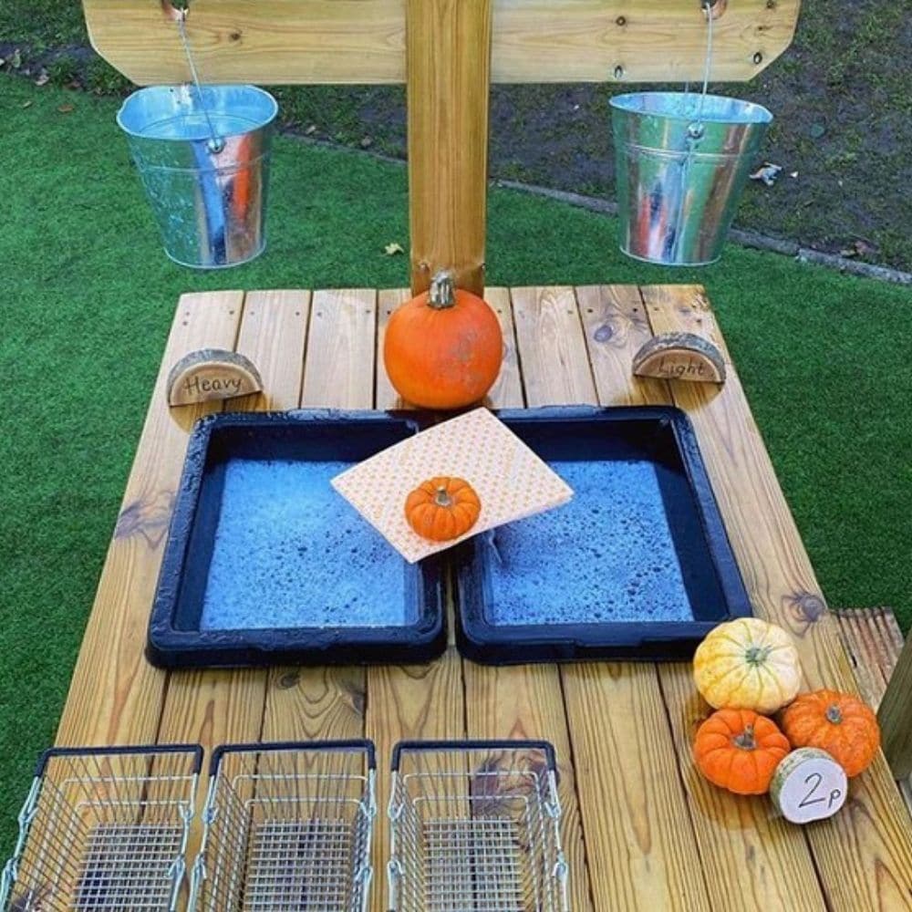 Childrens Wooden Water Outdoor Play Unit, The Children’s Wooden Weights and Scale Table is great for outdoor mathematical learning! The Children’s Wooden Weights and Scales Table is a robust, hard-wearing and educational resource. Removable wet play bowls and scales allow children to weigh and measure outdoor natural resources. Early years learn to estimate, predict, compare, contrast and evaluate different materials as they play. As well as experiencing different textures, they begin to understand the conc