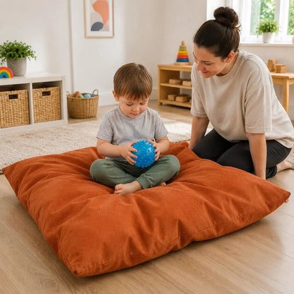 Chillout Wibble Wobble Mat seated balance activity in a naturally lit nursery