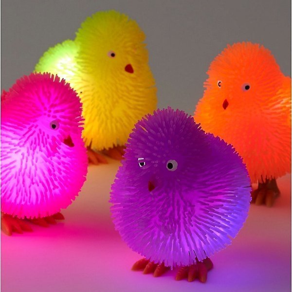 Chirpy Light Up Chicks, The Light-Up Puffer Chick is a cute little stress reliever and an awesome friend. The Chirpy Light Up Chicks keep you company during the day and will always be ready for whenever you need them as a hand held pocket sized fidget toy friend. The Tactile touch is so soft to touch and children will love the Chirpy Light Up Chicks. Go ahead and squish the Light Up Chicks, squeeze it, and pull the stretchy spikes. For more fun, tap the Puffer Chick to watch a display of colourful flashing 