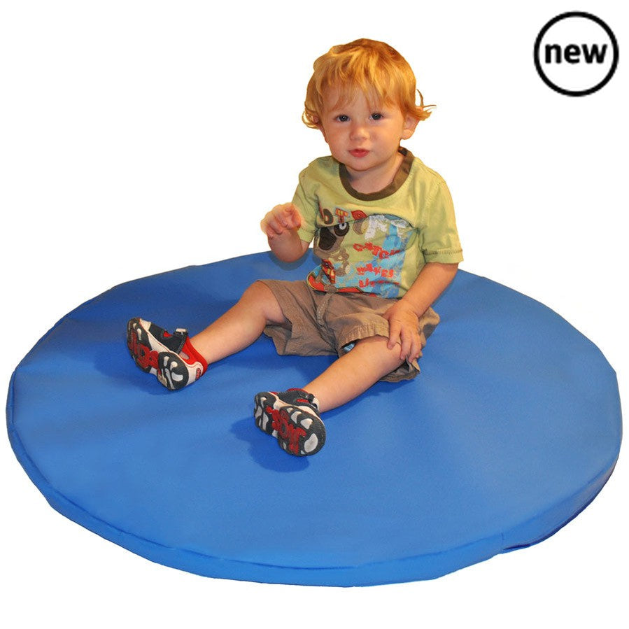 Circular Play Mat 95cm, The Circular Baby Room Play Mat is an ideal surface on which to base many baby room activities. They are soft to sit, crawl or fall on and encourage play and exploration in a safe environment. They are 120cm diameter and made in wipe clean high tenacity PVC. For both indoor and outdoor use. Must not be permanently left outdoors. Diameter 90cm x 3.5cm Expected delivery 10 working days Hand made in the UK, Circular Play Mat 95cm,Softplay mat,Soft play mat,Tumble play mat,soft play floo