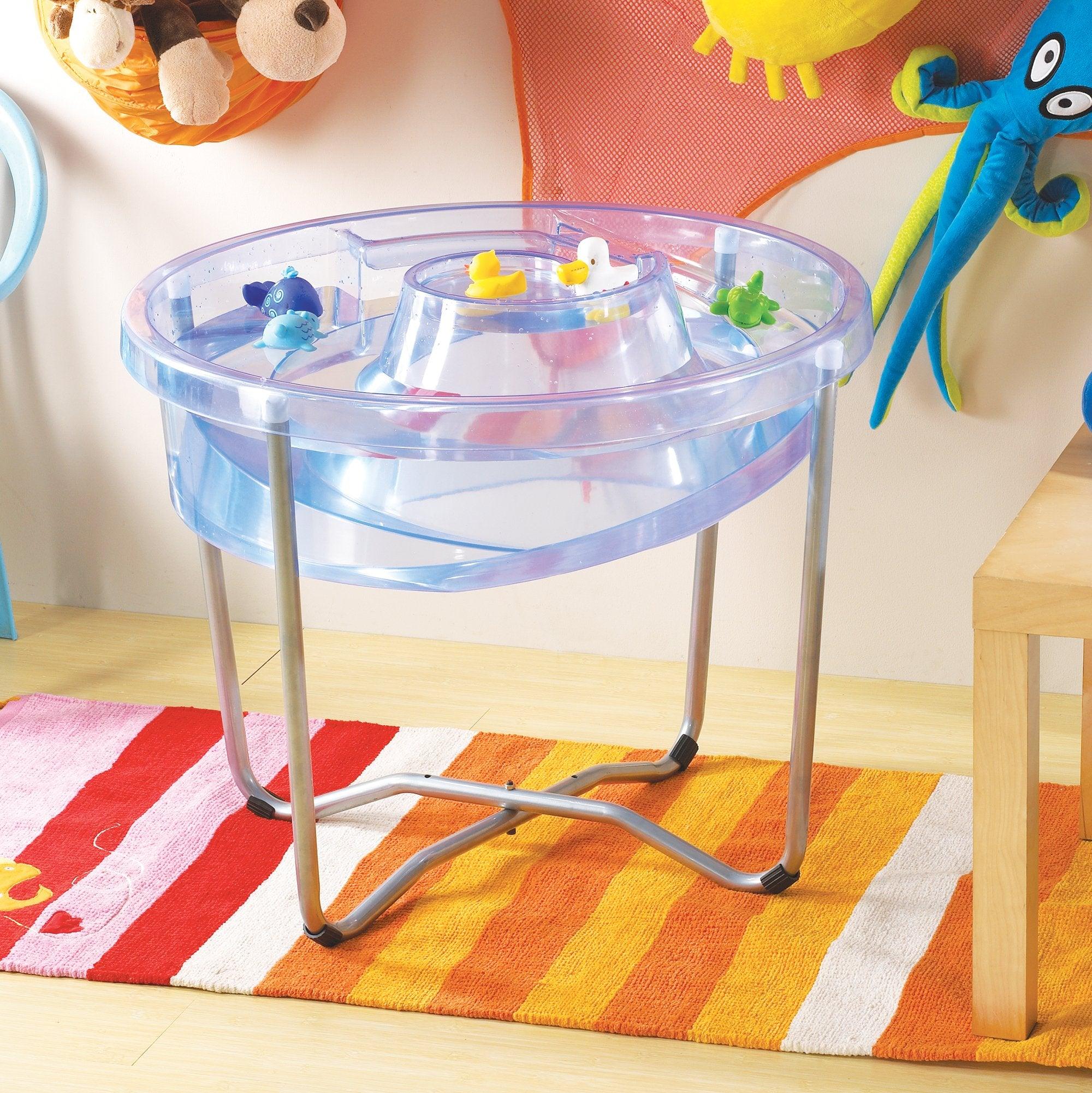 Circular Water Tray and Stand, The Circular Water Tray and stand set is a cleverly designed and versatile clear sand and water tray with central helter skelter for use as a water channel or roadway and an outer trough which together stimulate imaginative play. The Circular Water Tray and stand is beautifully designed and versatile clear sand and water tray with central helter-skelter for use as a water channel or roadway and an outer trough which together stimulate imaginative play.The Circular Water Tray a