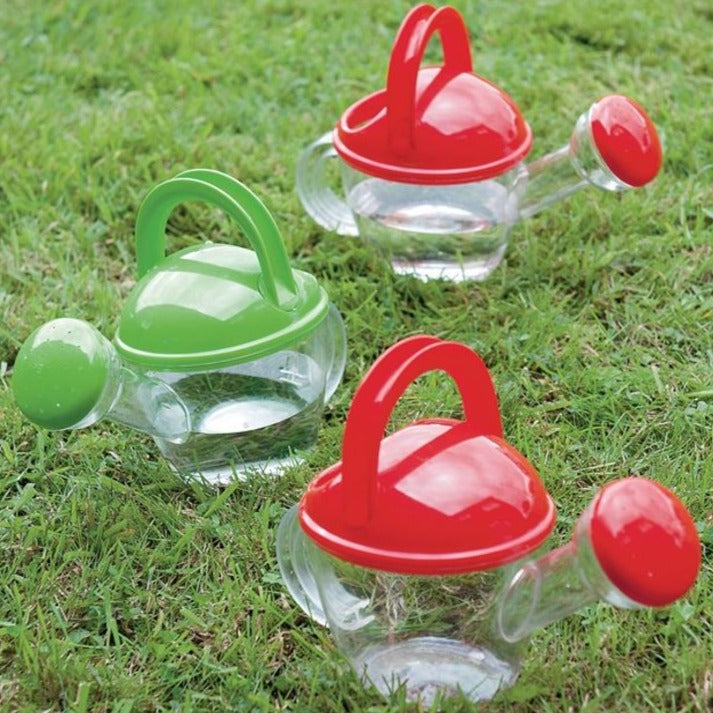 Clear Watering Can, Introducing the Clear Watering Can - the perfect addition to any junior outdoor range or beach and water toy collection! This transparent watering can is designed with functionality and fun in mind.With its generous capacity, the Clear Watering Can can be easily filled to the brim with water, allowing for ample watering without multiple refills. Its ergonomic handle ensures a comfortable grip, enabling effortless pouring and spraying of water. Whether it's watering plants, creating intri