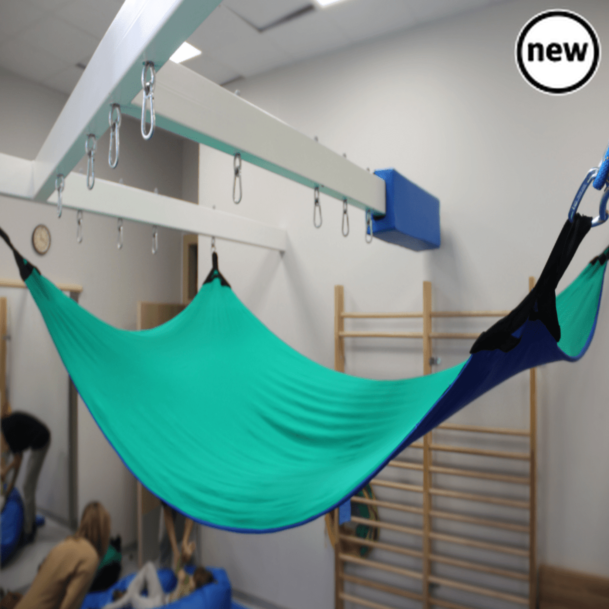 Cocoon Therapy Hammock, Introducing the Cocoon Therapy Hammock – your ultimate haven for relaxation and sensory therapy, ideal for home, therapy, or school use. Crafted from 100% Lycra, this hammock promises a cocoon-like experience that's both comforting and therapeutic. Measuring at a generous 130x300cm, this hammock provides ample space for you to unwind and find solace. Its lightweight and compact design make it effortlessly portable, allowing you to bring tranquility wherever you go. Attaching the hamm
