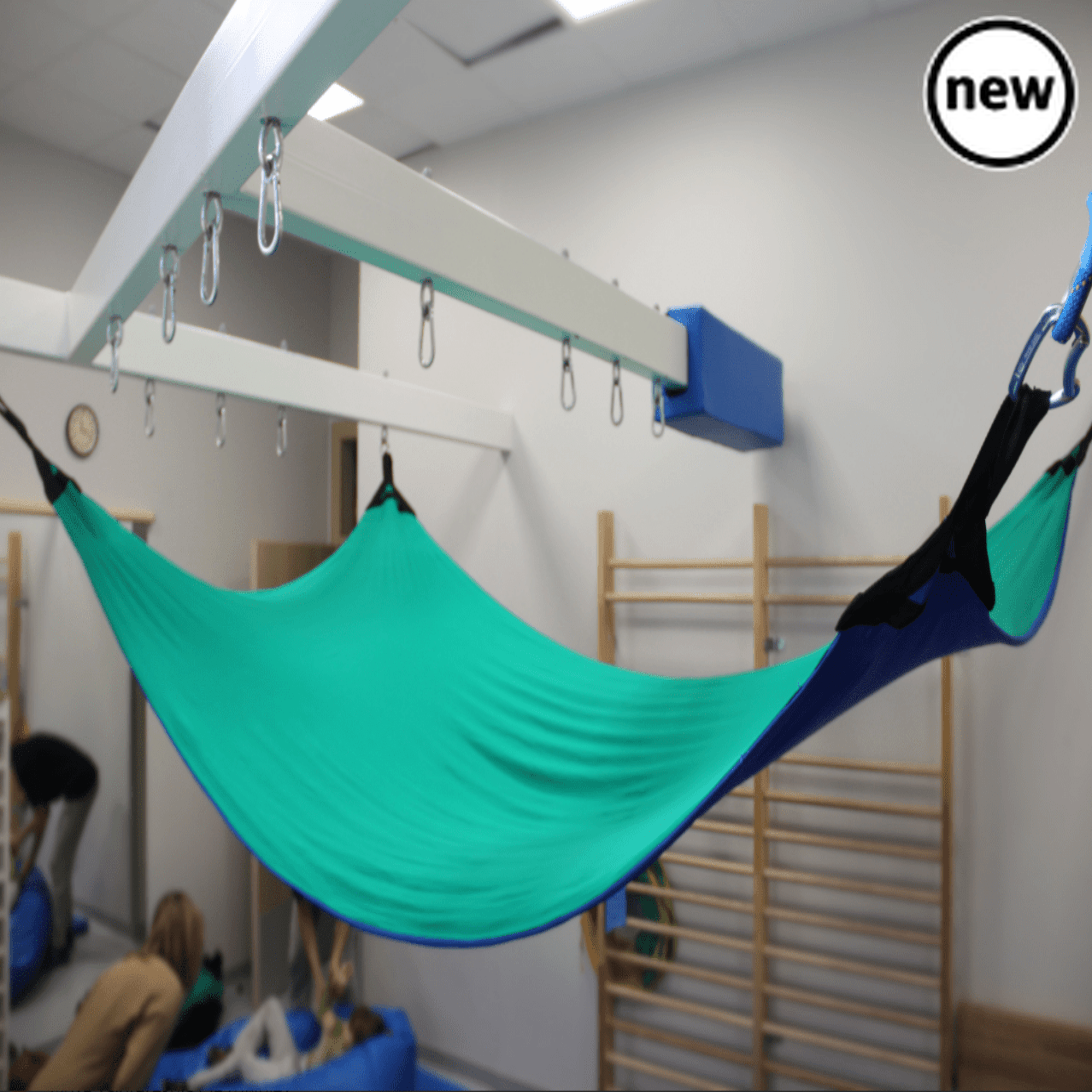 Cocoon Therapy Hammock, Introducing the Cocoon Therapy Hammock – your ultimate haven for relaxation and sensory therapy, ideal for home, therapy, or school use. Crafted from 100% Lycra, this hammock promises a cocoon-like experience that's both comforting and therapeutic. Measuring at a generous 130x300cm, this hammock provides ample space for you to unwind and find solace. Its lightweight and compact design make it effortlessly portable, allowing you to bring tranquility wherever you go. Attaching the hamm