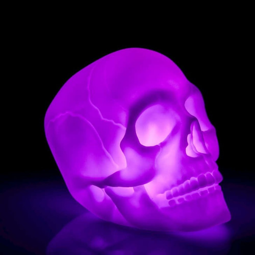 Colour Change Skull Light, Colourful lighting with a gothic twist, this Colour Change Skull Light adds a touch of drama to your space! Battery operated, this mini mood lamp is just the right size for desk tops providing a welcome distraction from screens, it's gently scrolling colours giving a relaxing back drop to your work, or it can be popped on the bedside table of older kids and teens to give a colourful twist to bedtime. Colour Change Skull Light With a simple on/off function, this colourful skull lam