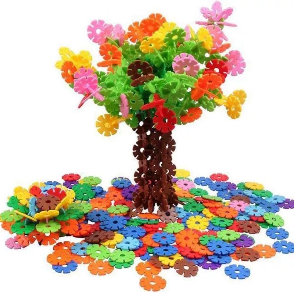 Connecting Flowers Game, Children will have endless creative opportunities with this simple but fun toy. Slot the colourful flower-shaped pieces to form a creative model. Comes in a sturdy plastic storage tub with convenient carry handle. The Connecting Flowers game are made of sturdy plastic are easy to grasp and therefore ideal for small children's hands. The 8-pronged potted flowers always stimulate new constructions. The Connecting Flowers Game is a great building fun for your little ones! With the prac